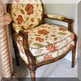 F23. Heather Brooks fauteuil chair with floral upholstery. 34”h x 27.5”w x 24”d